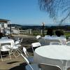 Reception tables and seating for your guests during cake cutting and toast.