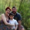 A family portrait after their ceremony. Their son enjoyed feeding the trout and walking the trails in the woods.