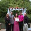 A happy family. Bride and groom with an Oregon Marriage Certificate 