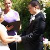 wedding vows exchanged on the dock of a pond.